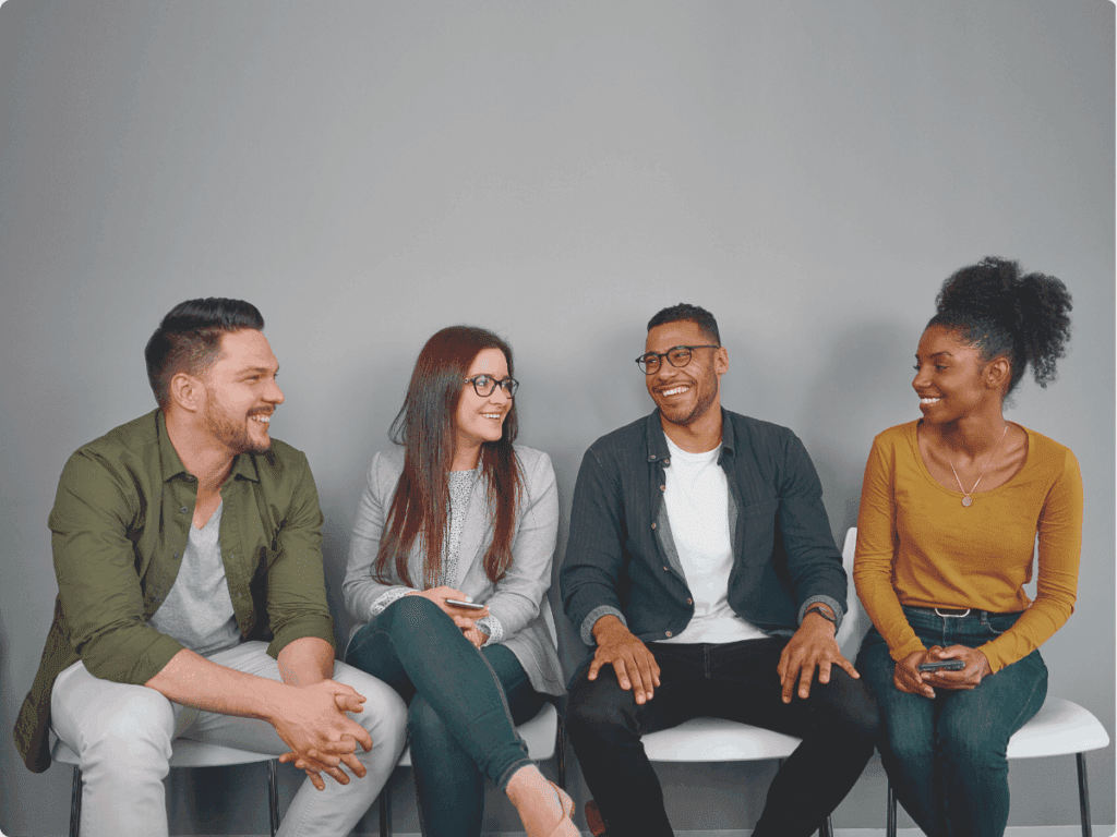 An image presenting content moderators collaborating together.