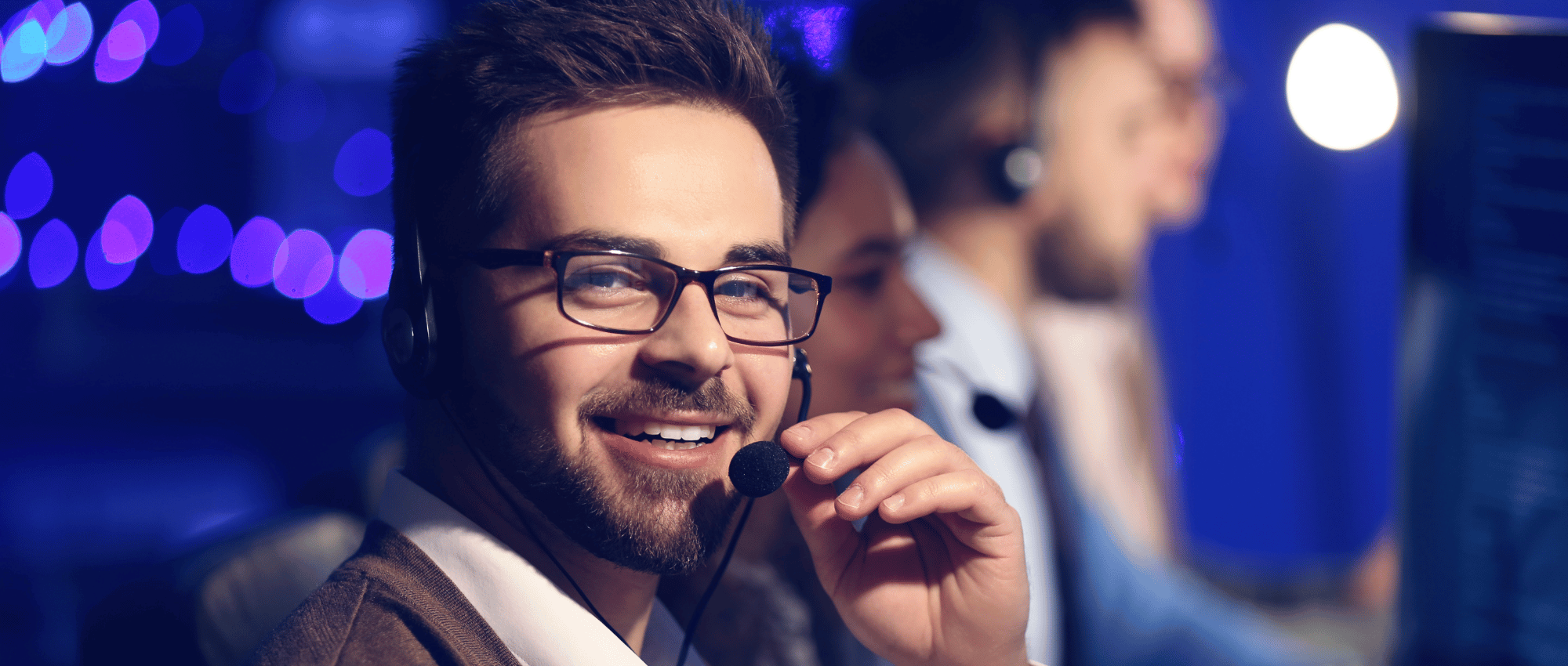 A picture of happy technical support agents working in the modern contact center.