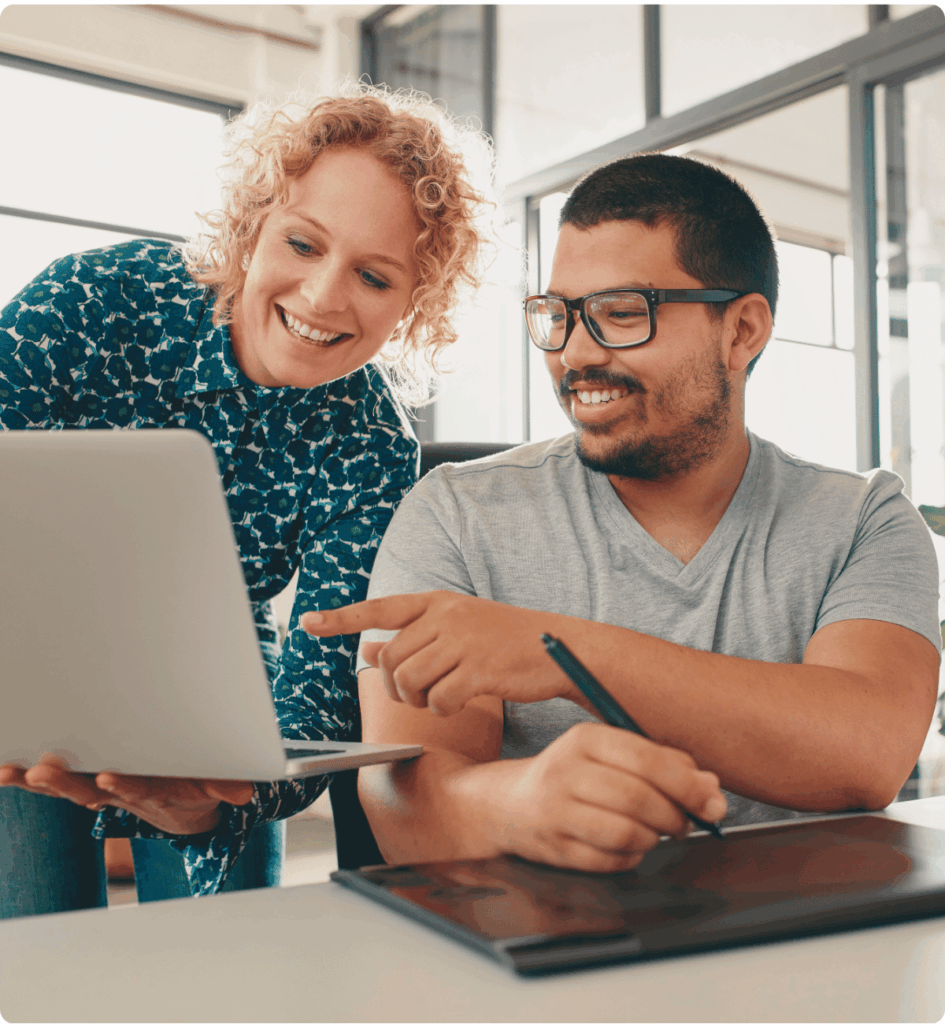 A picture presenting two data annotators working with data.