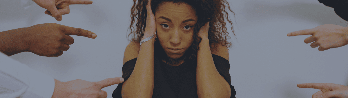 A picture of a woman experiencing online hate and harassment