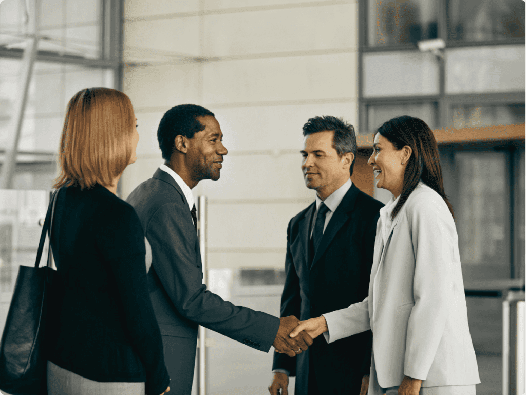 A picture of the business managers starting the meeting.