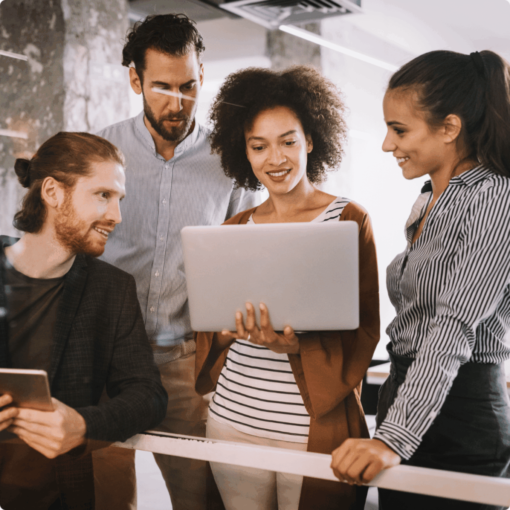A picture of the technical support team planning the outsourcing project launch.