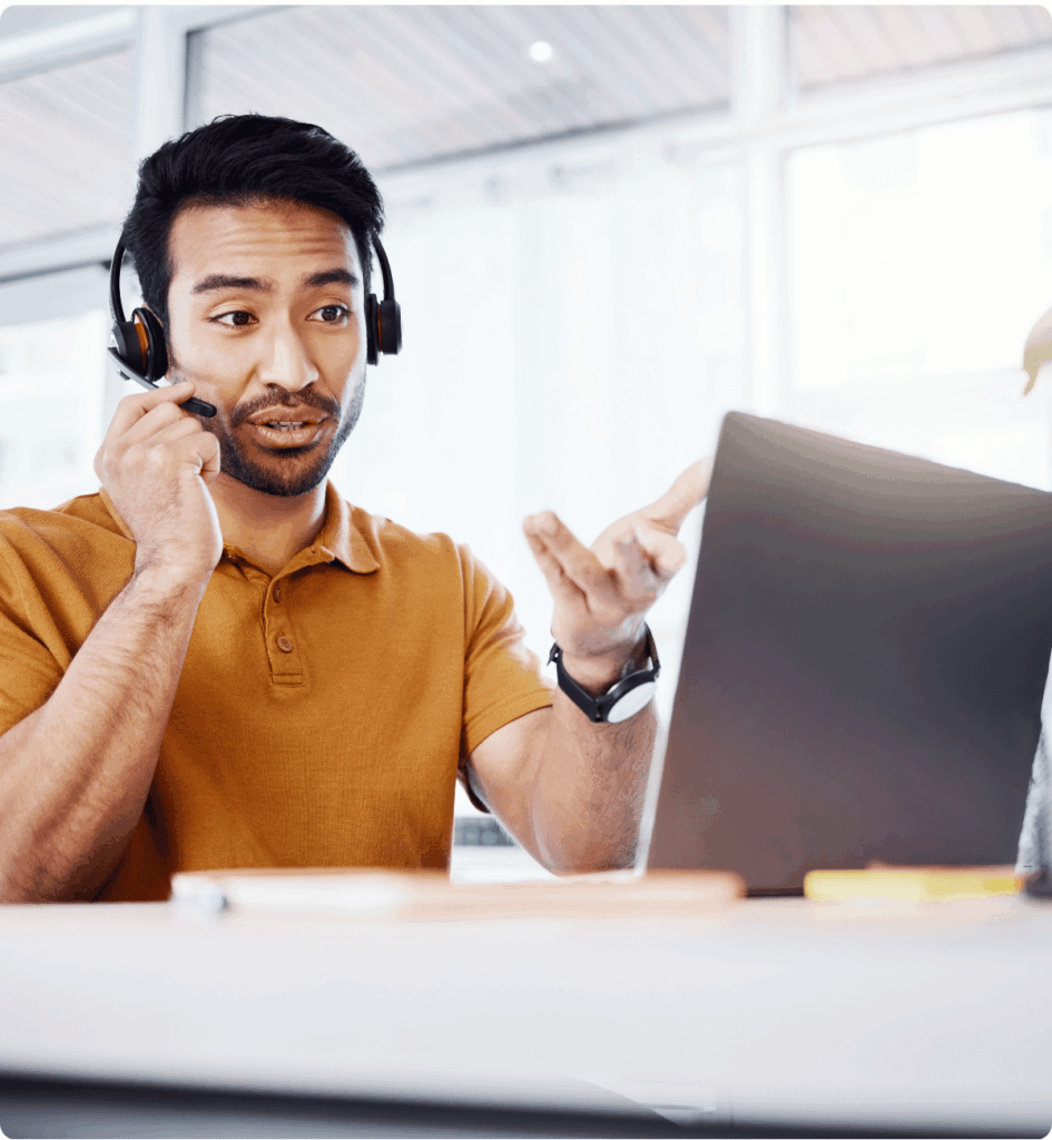 A picture of an agent serving customers through technical support outsourcing.